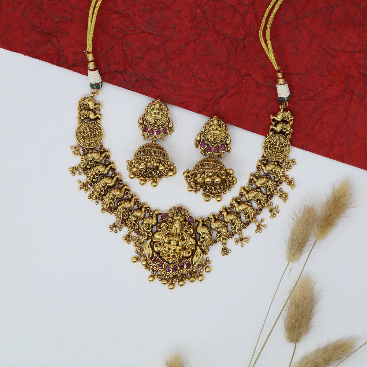 Majestic Lakshmi Idol Necklace with Sculpted Peacock Panel Links