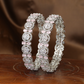 Celestique Crystal Cluster Rhodium Bangles with Round Halo Panels
