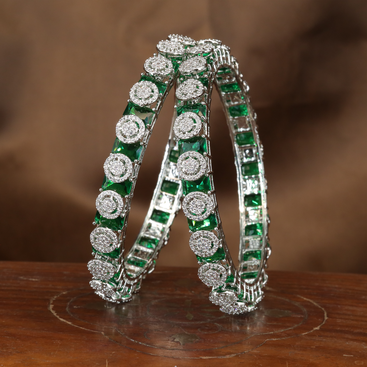 Brilliant Halo Crest Rhodium Bangles with Repeating Circular Disc Panels
