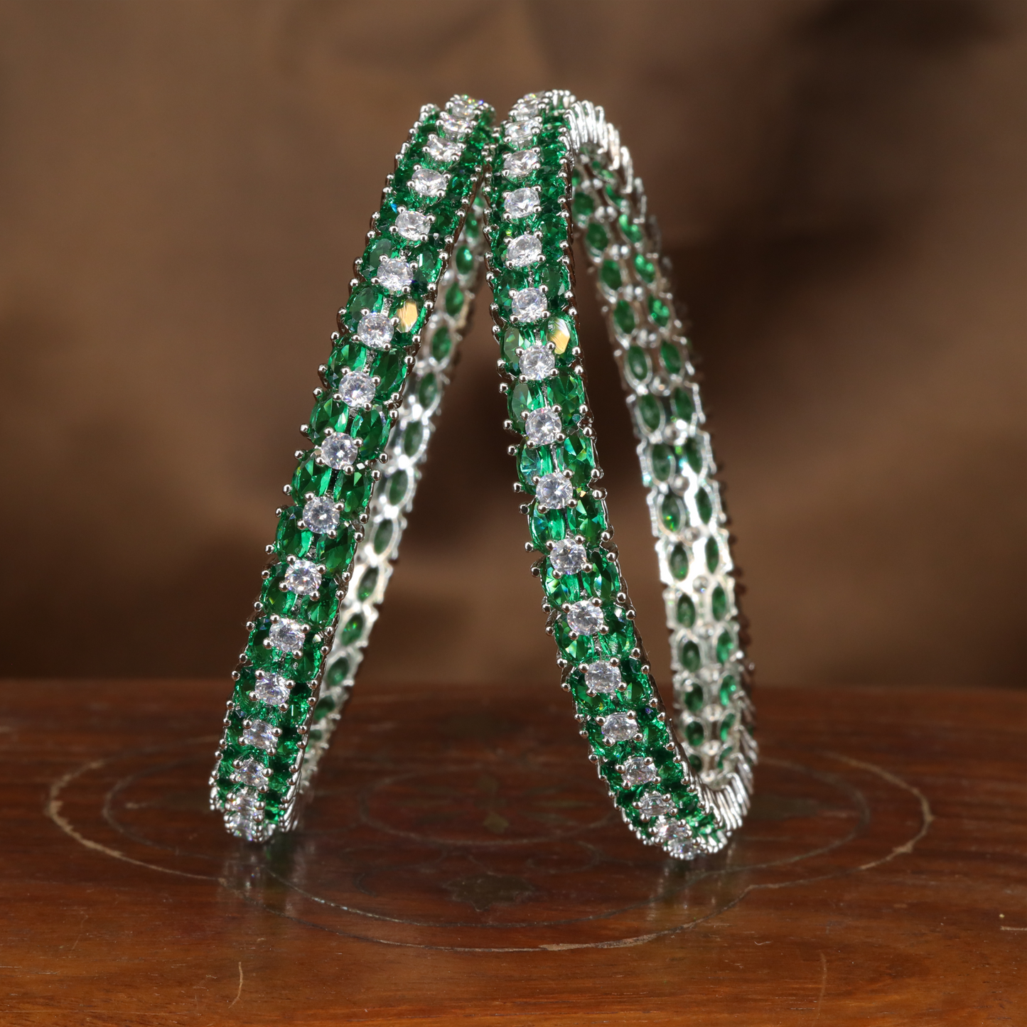 Regal Dual Line Rhodium Bangles with Emerald Panels and Crystal Accents