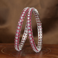 Regal Dual Line Rhodium Bangles with Emerald Panels and Crystal Accents