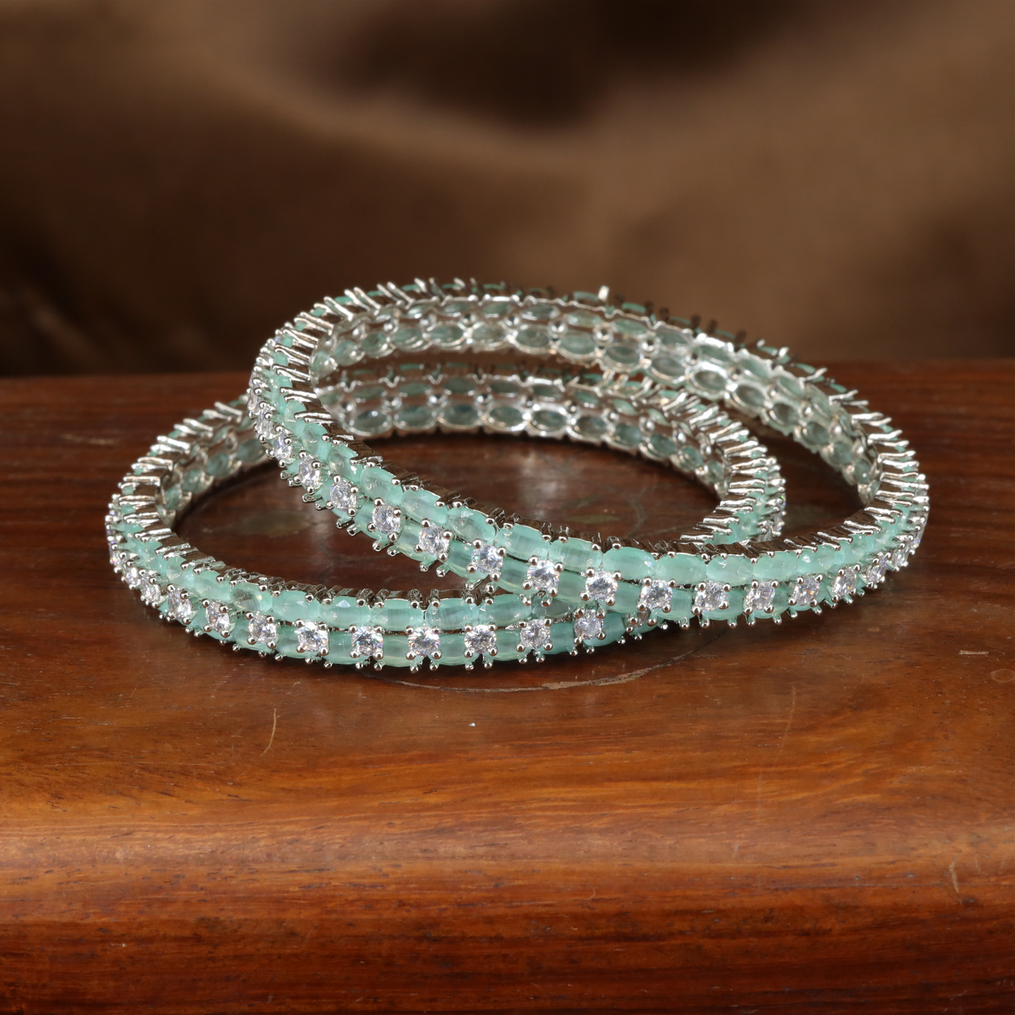 Regal Dual Line Rhodium Bangles with Emerald Panels and Crystal Accents