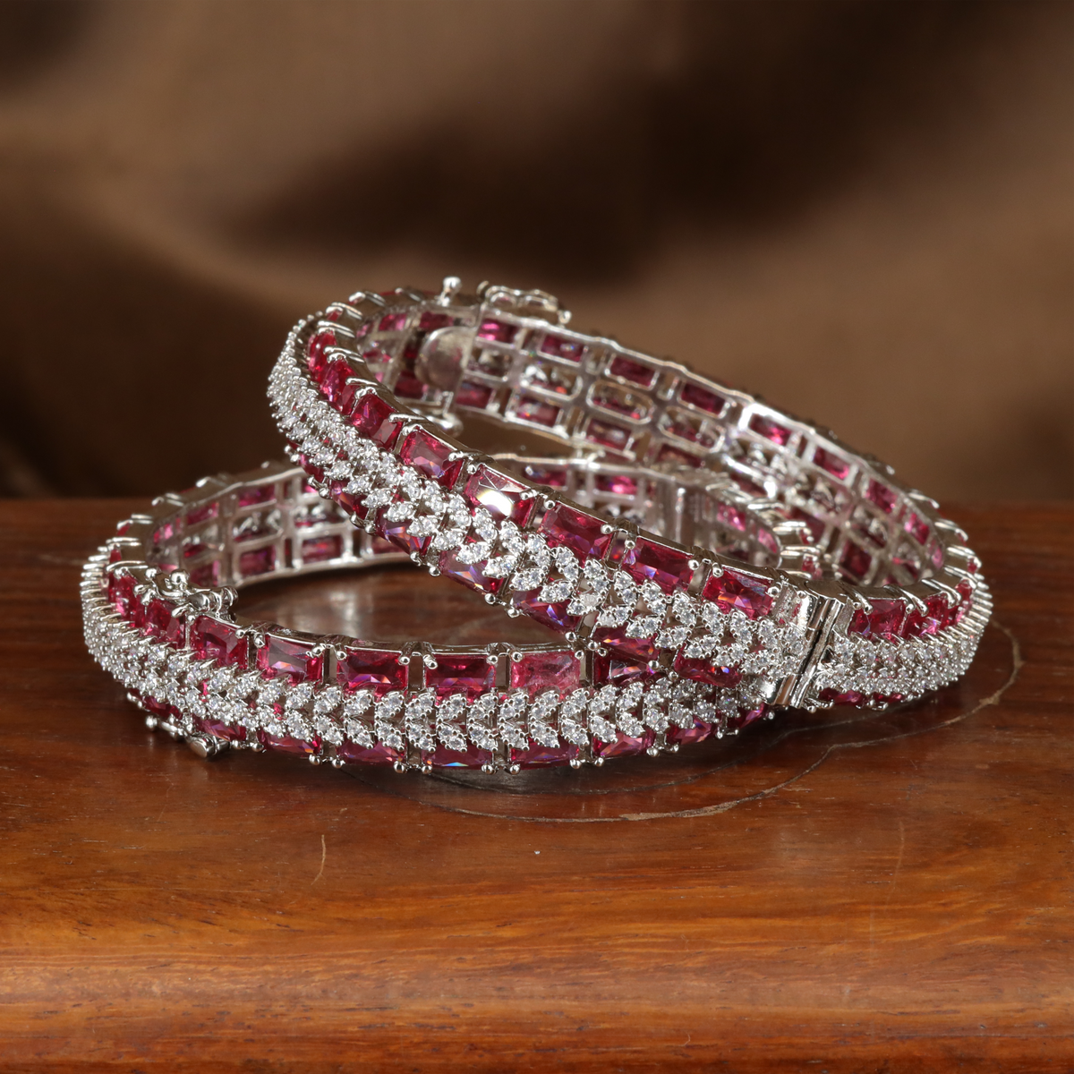 Sculpted Dual-Line Stonework Bangles with Geometric Panel Arrangement