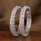 Sculpted Dual-Line Stonework Bangles with Geometric Panel Arrangement