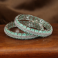 Sculpted Dual-Line Stonework Bangles with Geometric Panel Arrangement