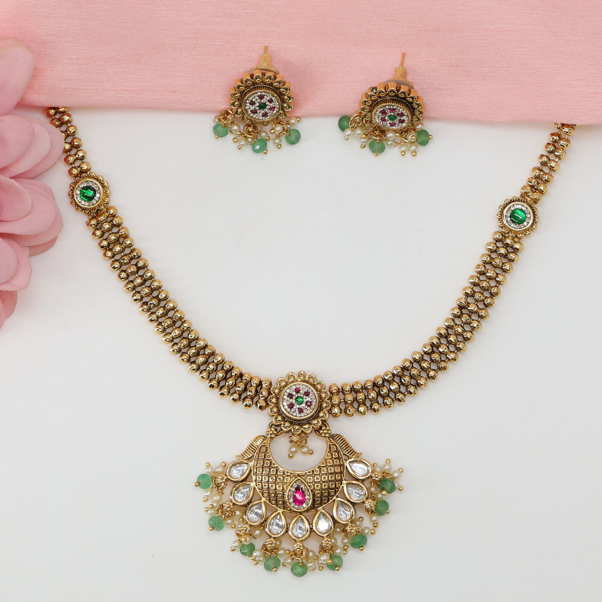 Floral Medallion Necklace with Twin Bead Row Collar and Crescent Pendant