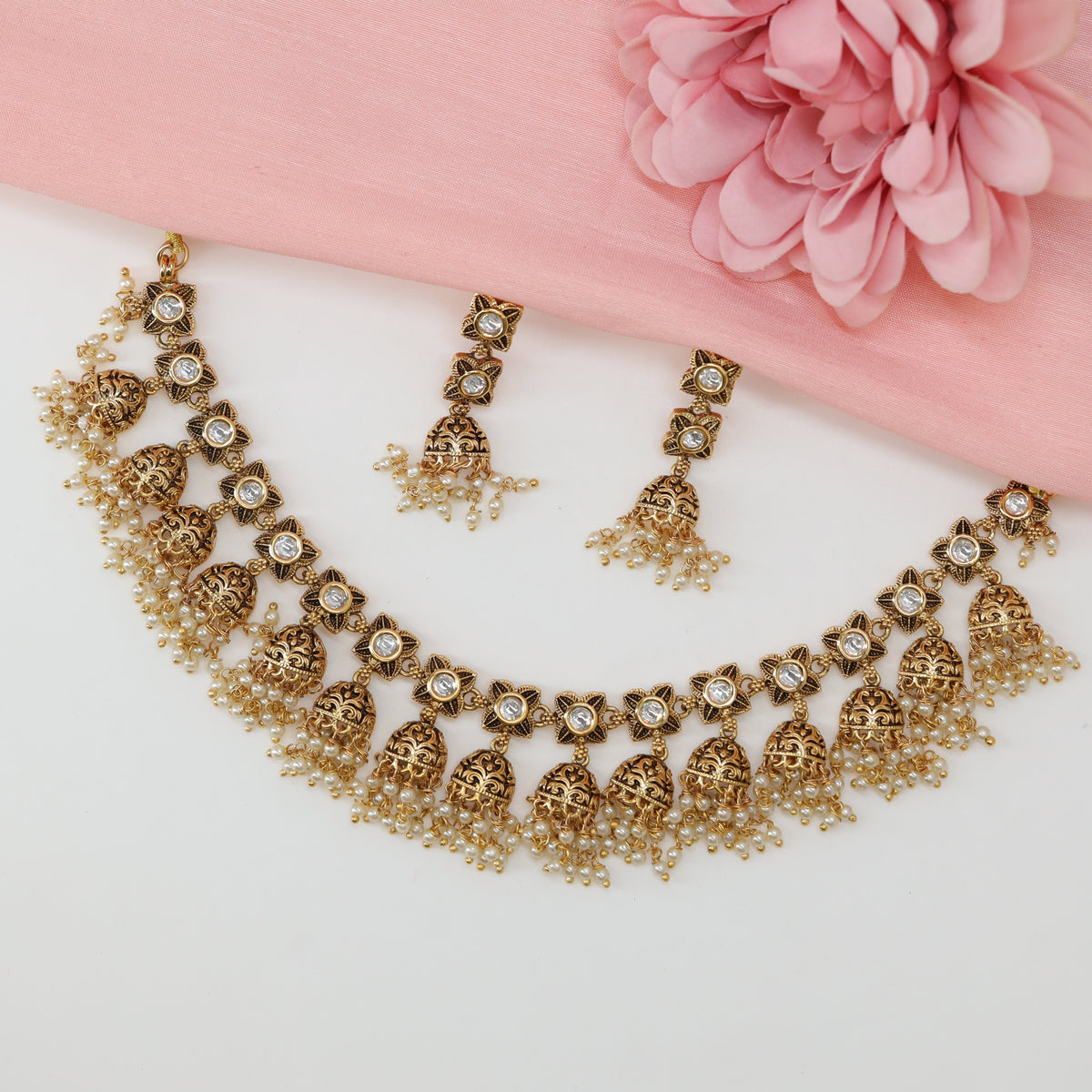 Traditional Jhumka Drop Necklace with Repeating Blossom Connectors