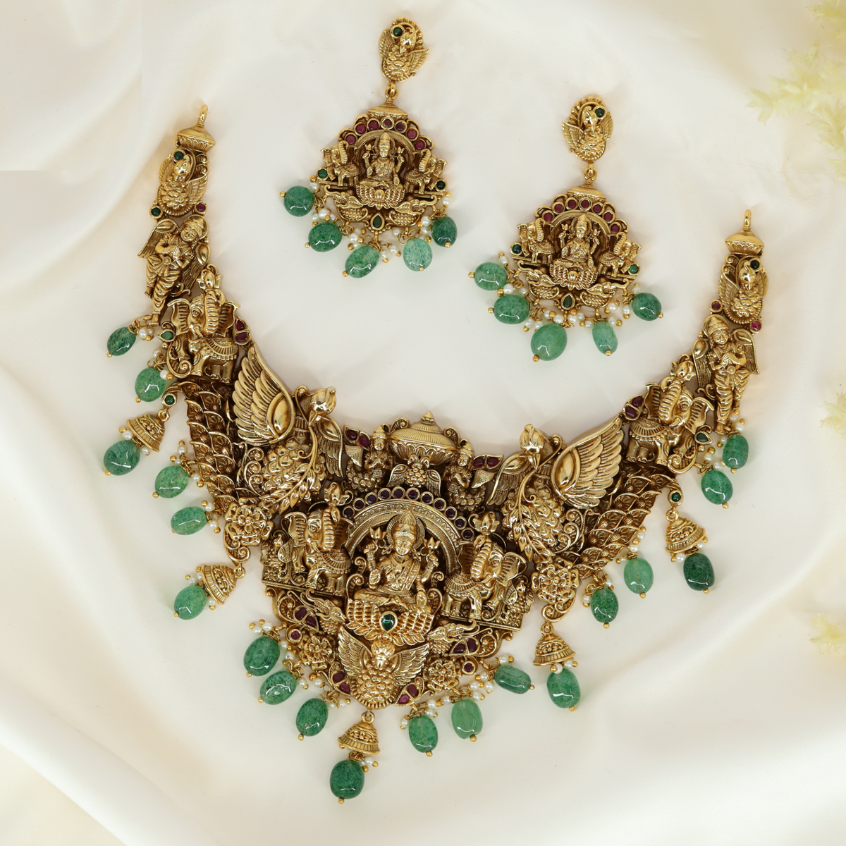 Sacred Lakshmi Garuda Crest Necklace with Sculpted Wing Panels and Emerald Drop Fringe