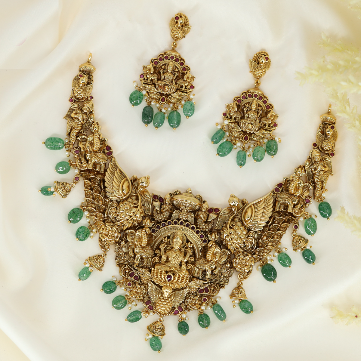 Sacred Lakshmi Garuda Crest Necklace with Sculpted Wing Panels and Emerald Drop Fringe