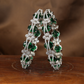 Graceful Connector Motif Bangles with Alternating Oval Settings and Glittering Cluster Links