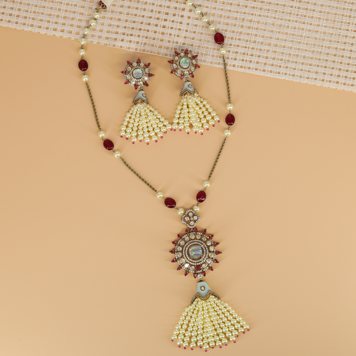 Elegant Beaded Chain Necklace with Sunburst Pendant and Tassel Earrings