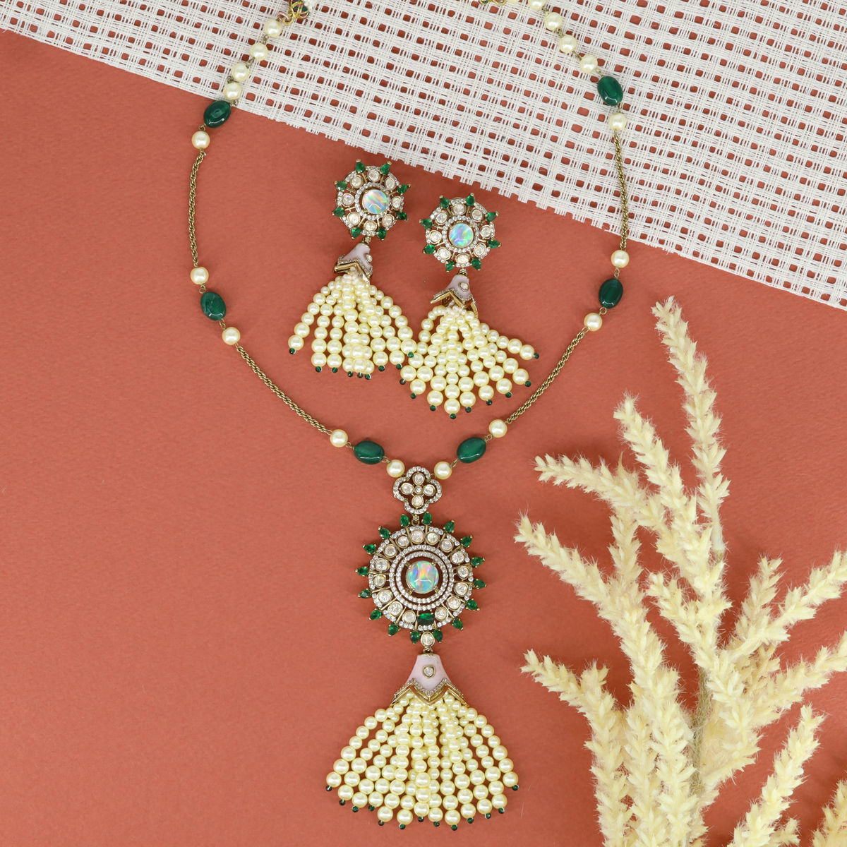 Elegant Beaded Chain Necklace with Sunburst Pendant and Tassel Earrings
