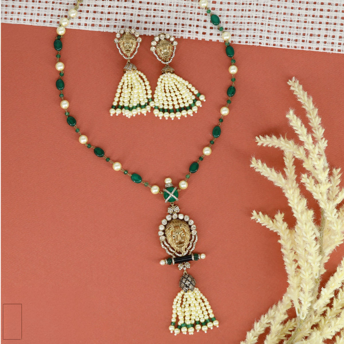 Beads long haara with an ornate lion face pendant