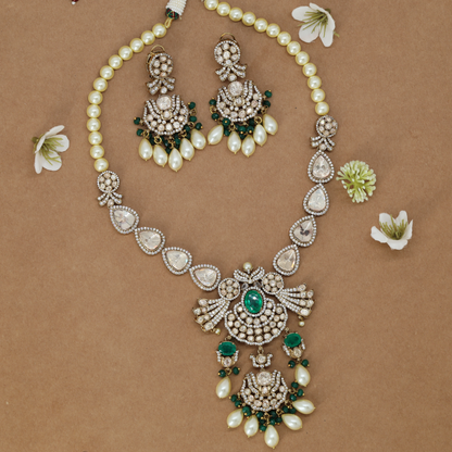 Ornate Teardrop Link Necklace with Decorative Central Pendant and Dangling Elements