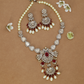 Ornate Teardrop Link Necklace with Decorative Central Pendant and Dangling Elements