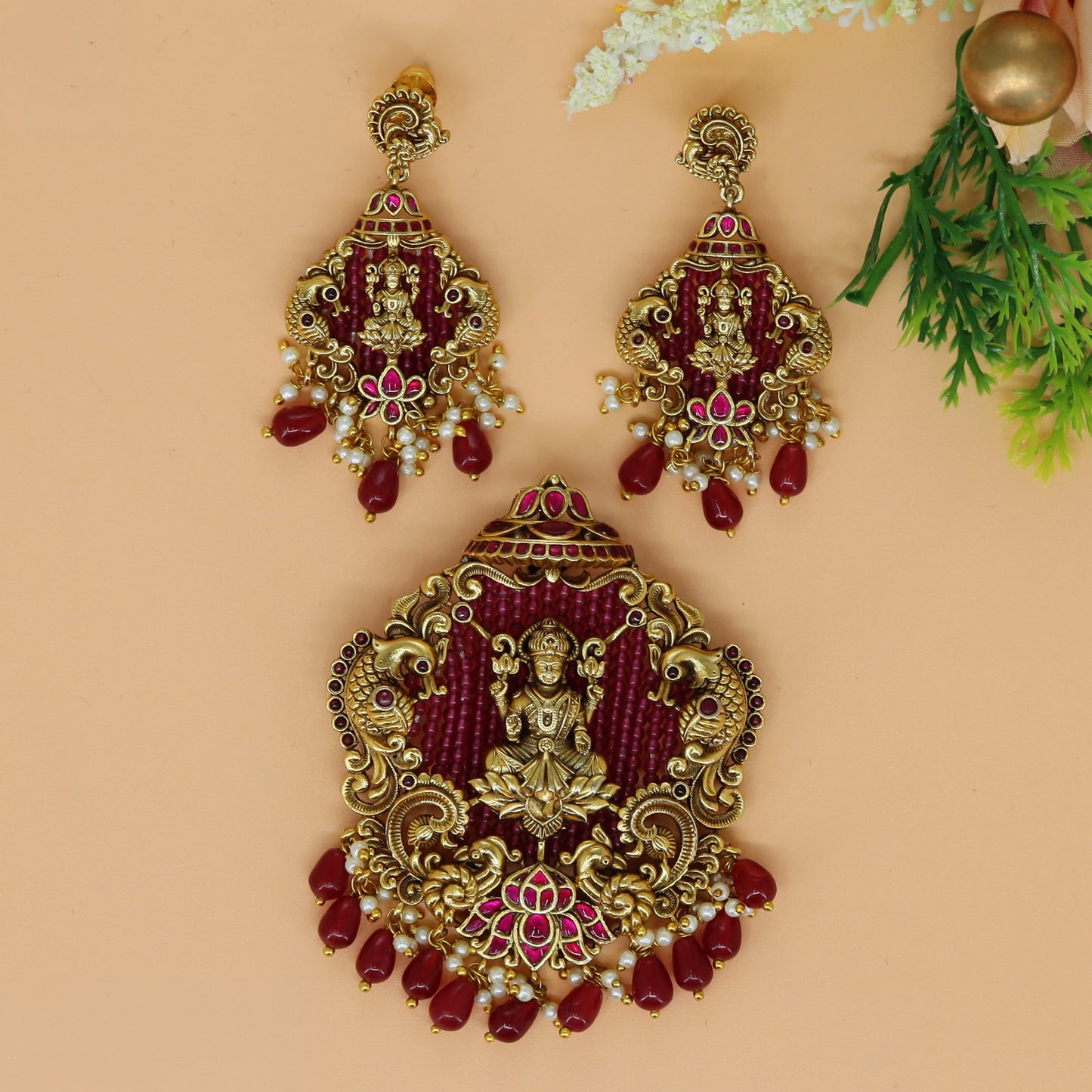Antique Lakshmi pendant set with twin peacock detailing and floral scrollwork