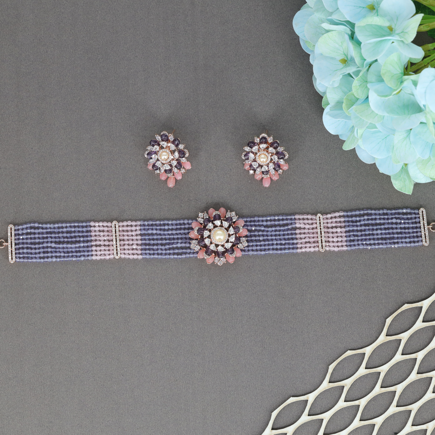 Stylised Floral Crytalstal Choker with Structured Bead Strands and Radiating Medallion