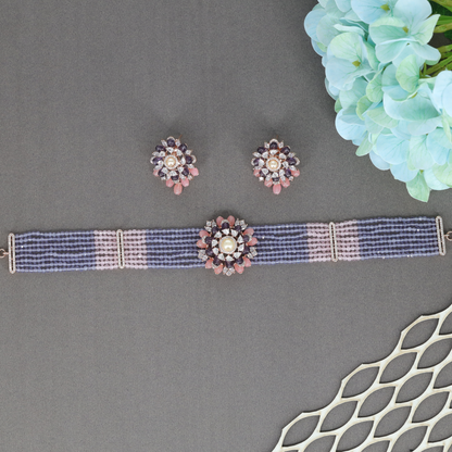 Stylised Floral Crytalstal Choker with Structured Bead Strands and Radiating Medallion