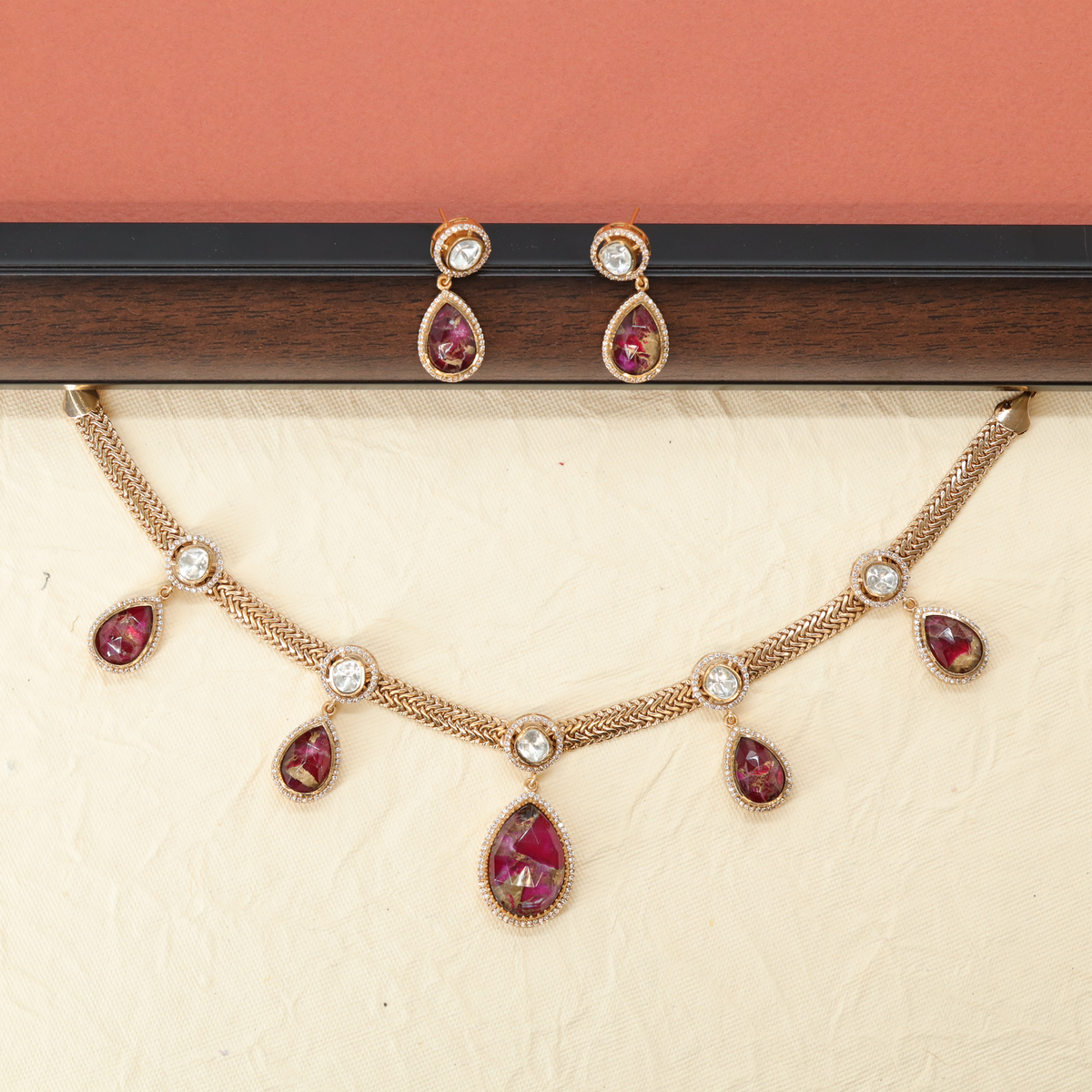 Elegant Rope Style Necklace with Drop Motifs and Matching Earrings