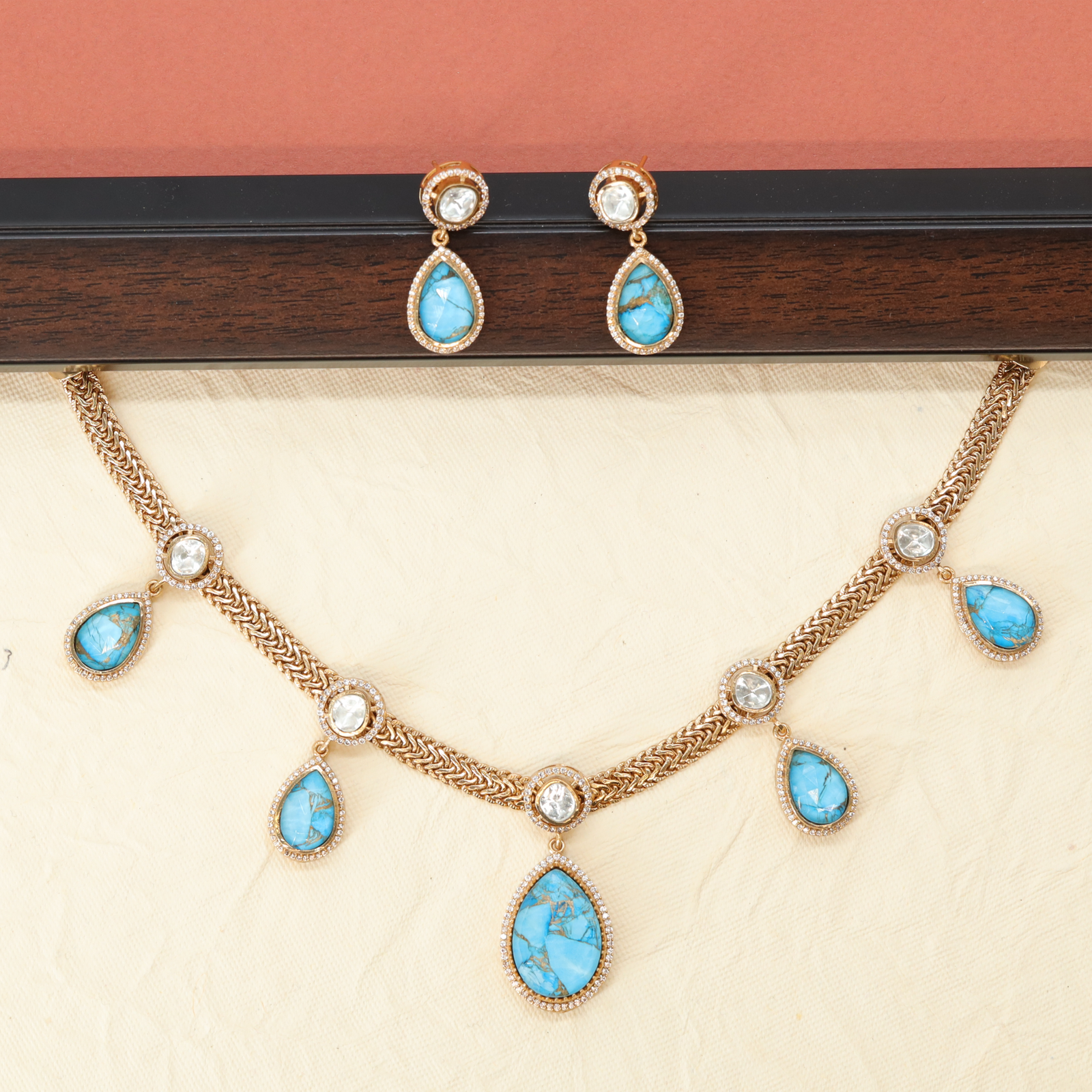 Elegant Rope Style Necklace with Drop Motifs and Matching Earrings