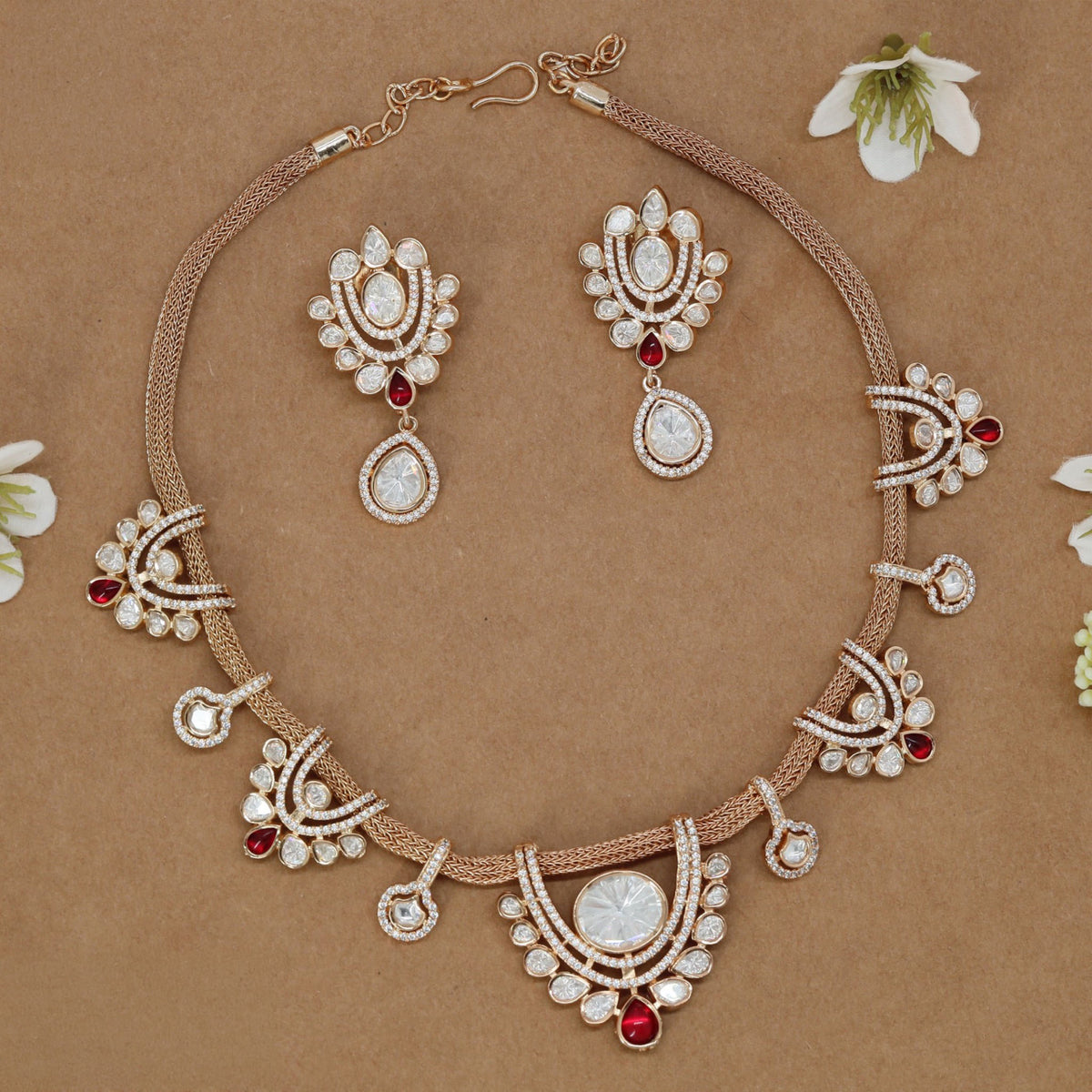 Designer Kundan necklace set with coordinated teardrop