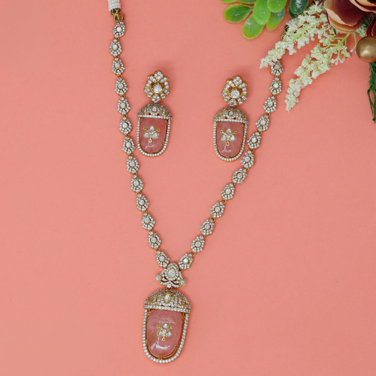 Kundan necklace with a framed rectangular pendant and matching earrings