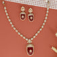 Kundan necklace with a framed rectangular pendant and matching earrings