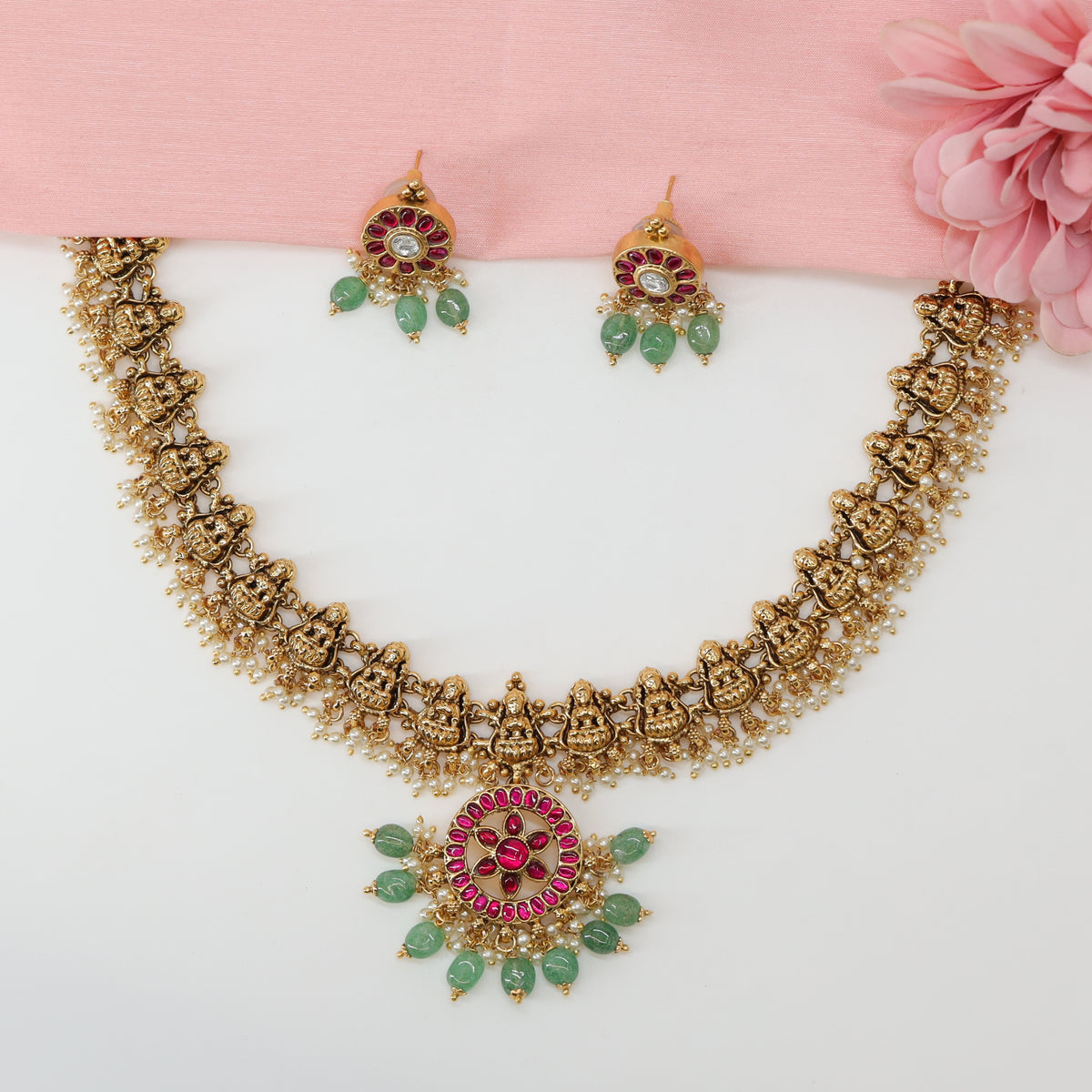 Grand Lakshmi Relief Necklace with Linked Shrine Frames and Circular Gem Pendant