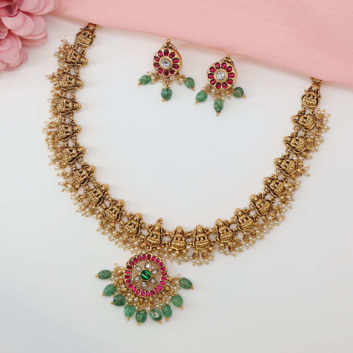 Grand Lakshmi Relief Necklace with Linked Shrine Frames and Circular Gem Pendant