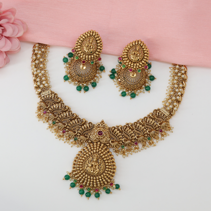 Lakshmi Radiant Disc Antique Necklace with Ornamental Scroll Pattern