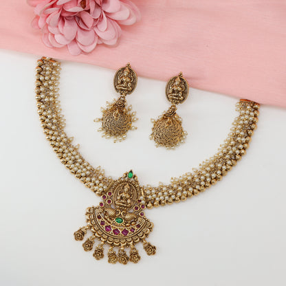 Lakshmi Oval Crest Antique Pearl Necklace with Sculpted Peacock Base