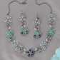 Serene Blossom Necklace Set with Decorative Floral Panels and Vine Accents