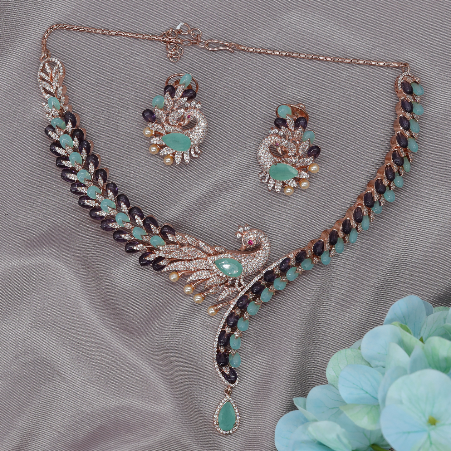 Graceful Peacock Motif Crystal Necklace with Flowing Feather Design and Drop Pendant