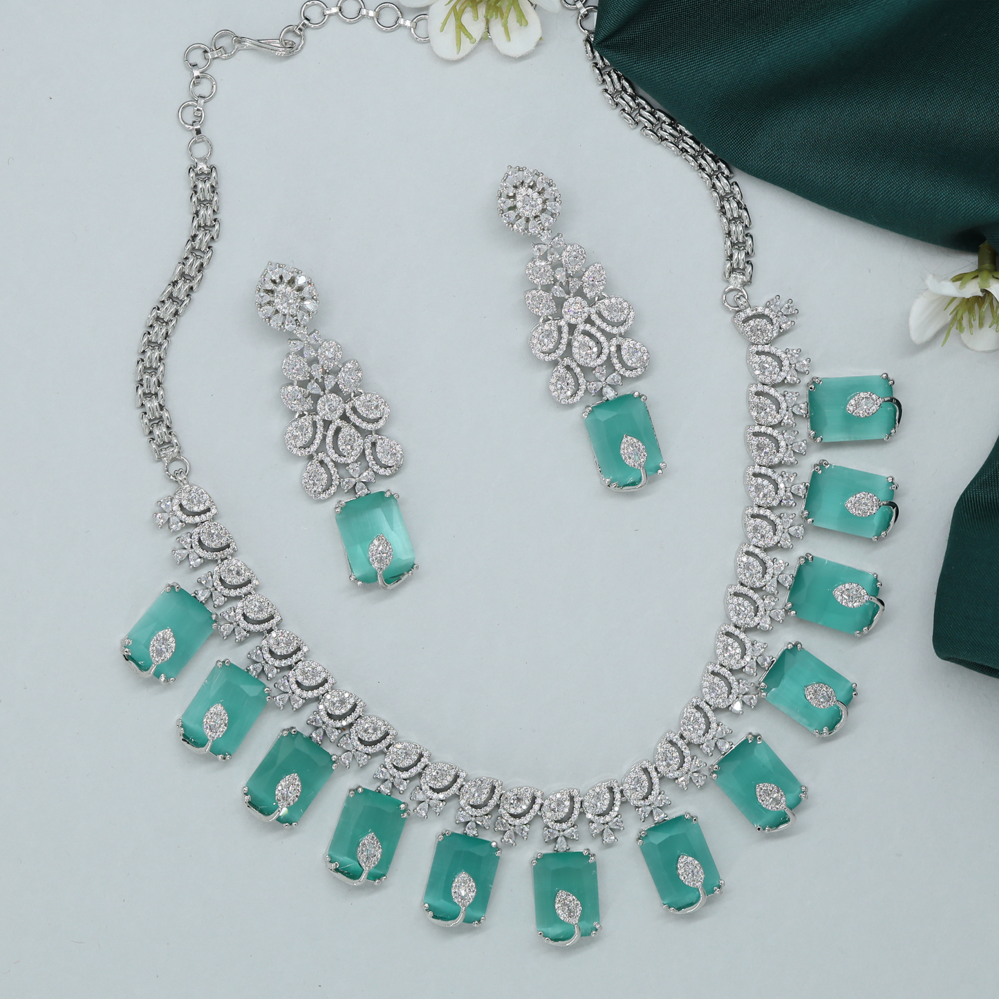 Artistic Rectangular Necklace with Repeating Drop Elements and Stylish Finish