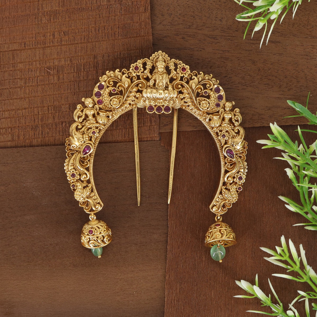 Royal Lakshmi arch with intricate floral patterns and beautifully crafted hanging bells