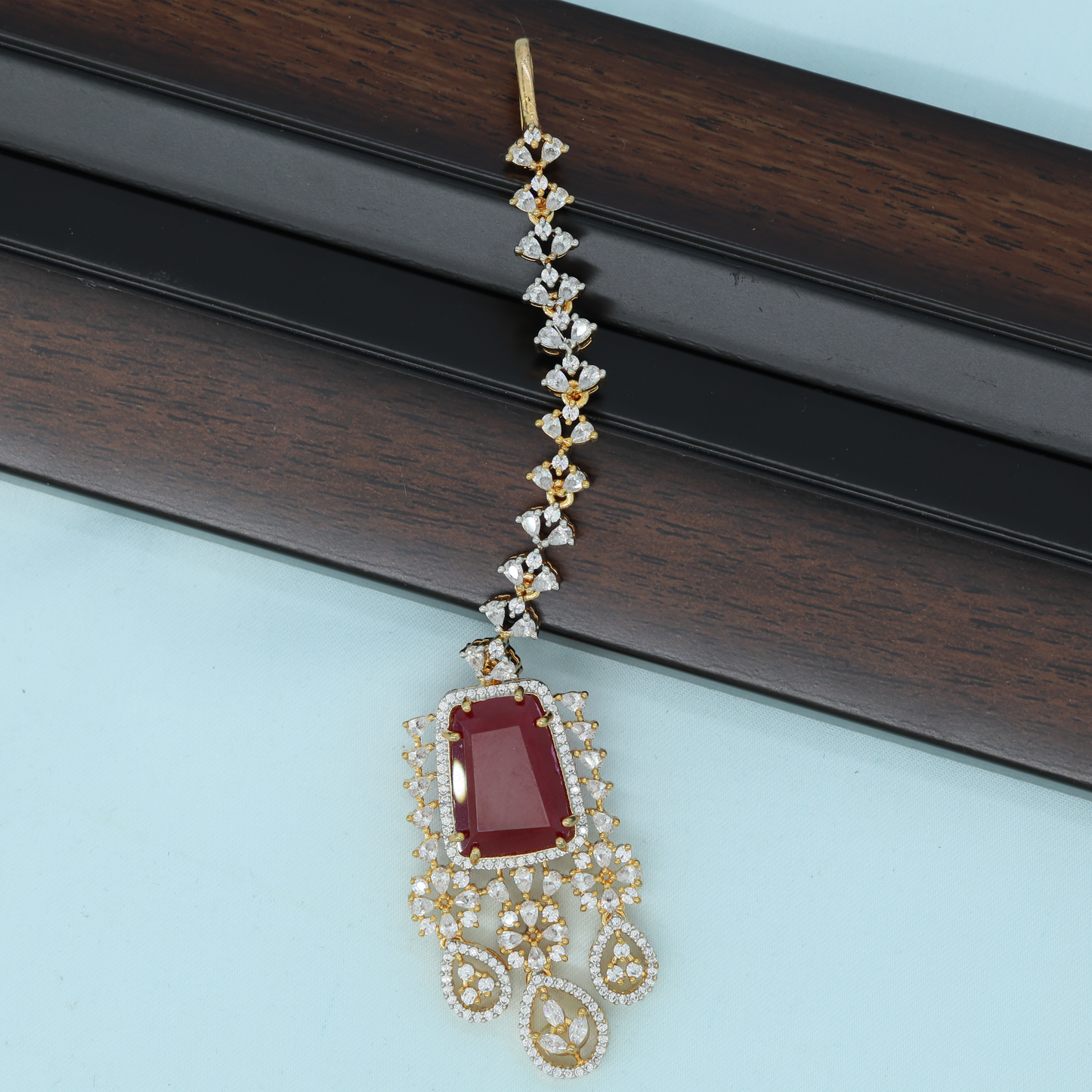 Elegant Floral Tikka with Structured Chain
