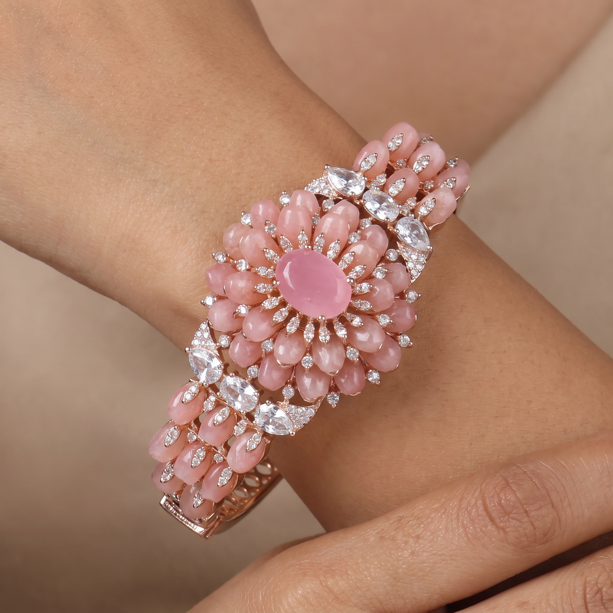 Curving Floral Cluster Bangle with Petal Arrangement and Statement Center