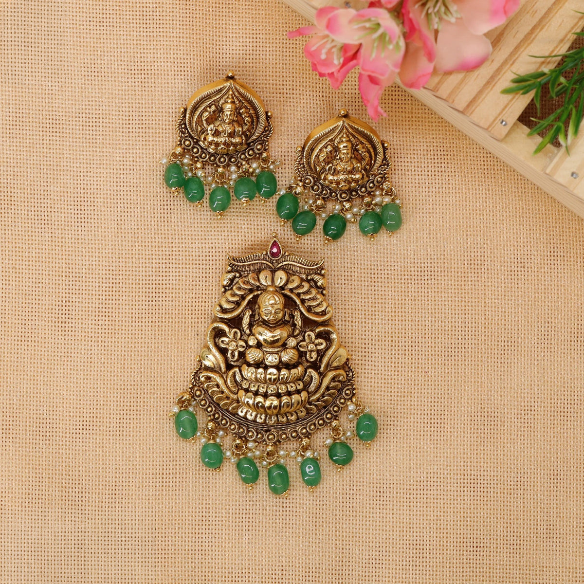 Lakshmi pendant set featuring ornate arches and delicate hanging elements