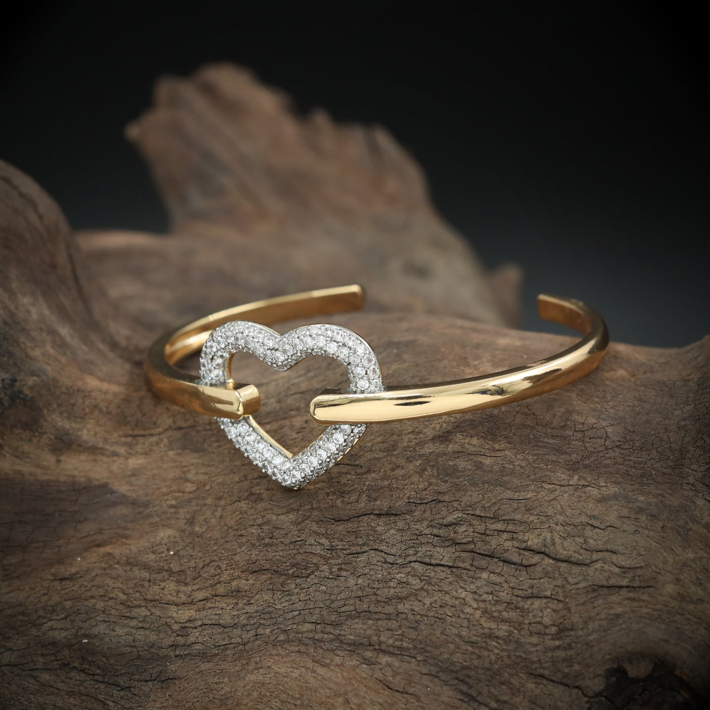 Romantic Open Cuff Bracelet with Heart Frame and Studded Detailing