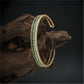 Sleek Dual Line Open Cuff Bracelet with Channel Set Accents and Studded Border