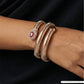 Serpentine Coil Bracelet with Ribbed Texture and Oval Accent Head