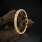 Classic Pattern Bracelet with Continuous Design and Raised Motif Elements