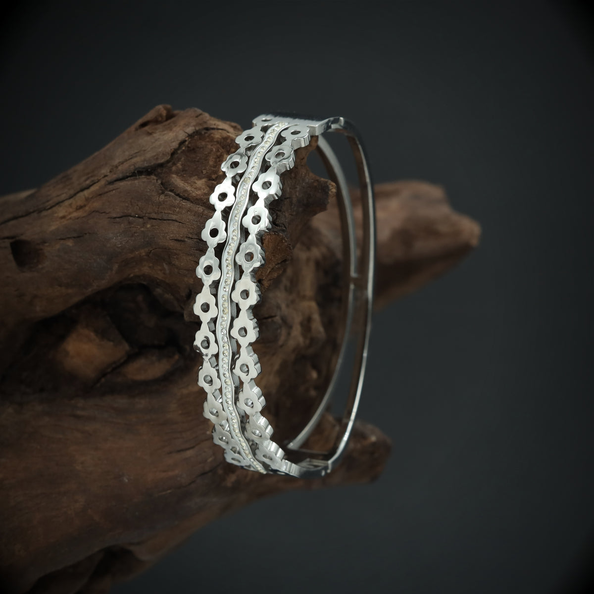 Stylish Blossom Motif Bracelet with Structured Rows and Central Accent Detailing
