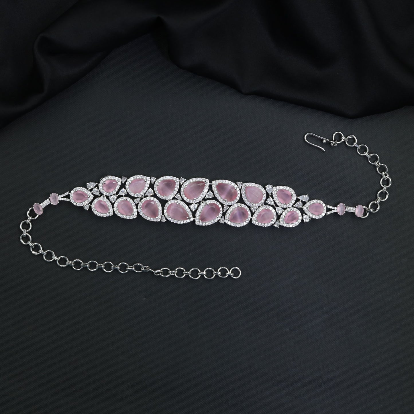 Grand teardrop Rhodium Choker with repeating framed elements and structured openwork