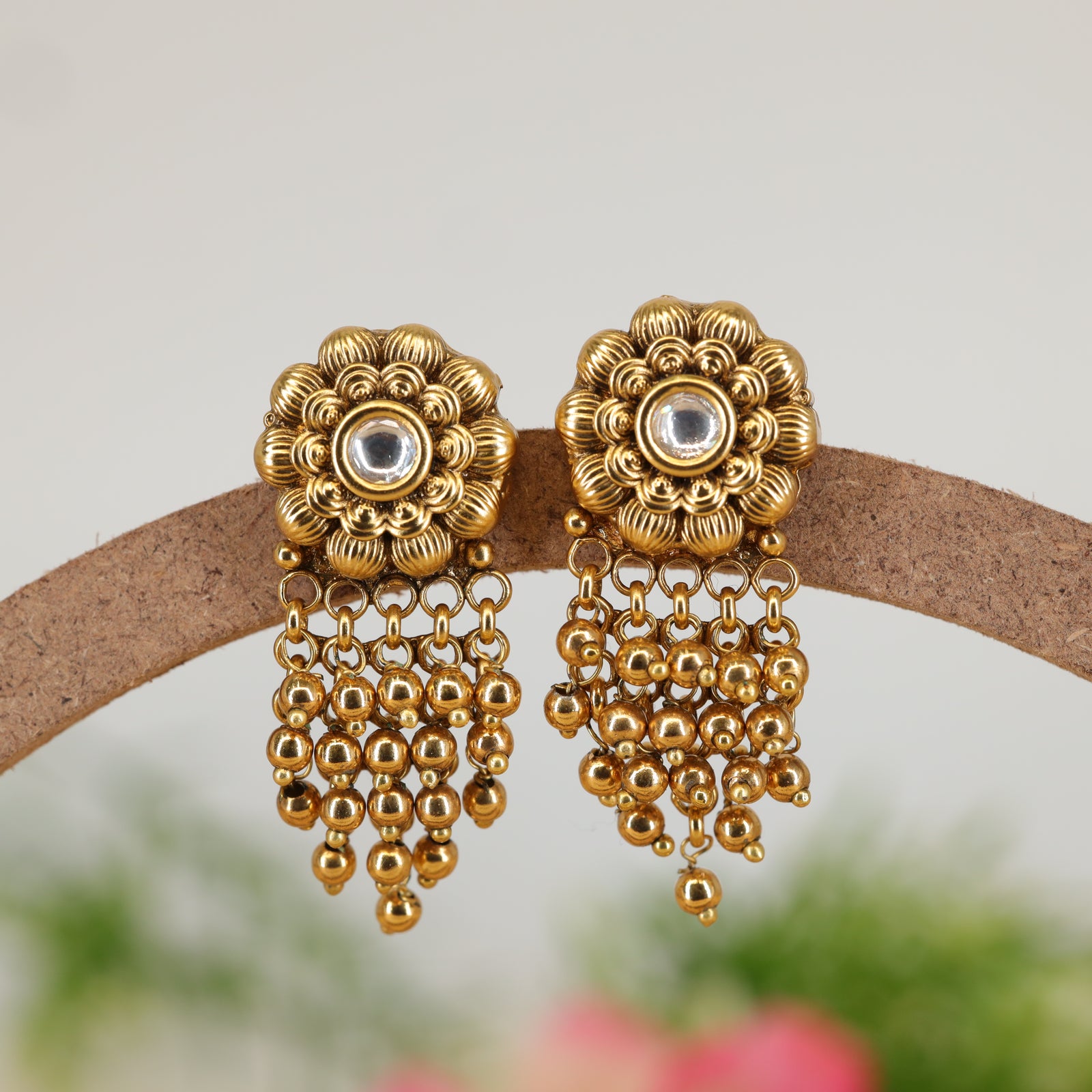 Ratnamandala Petal Relief Stud with Framed Stone Centre and Hanging Bead Curtains