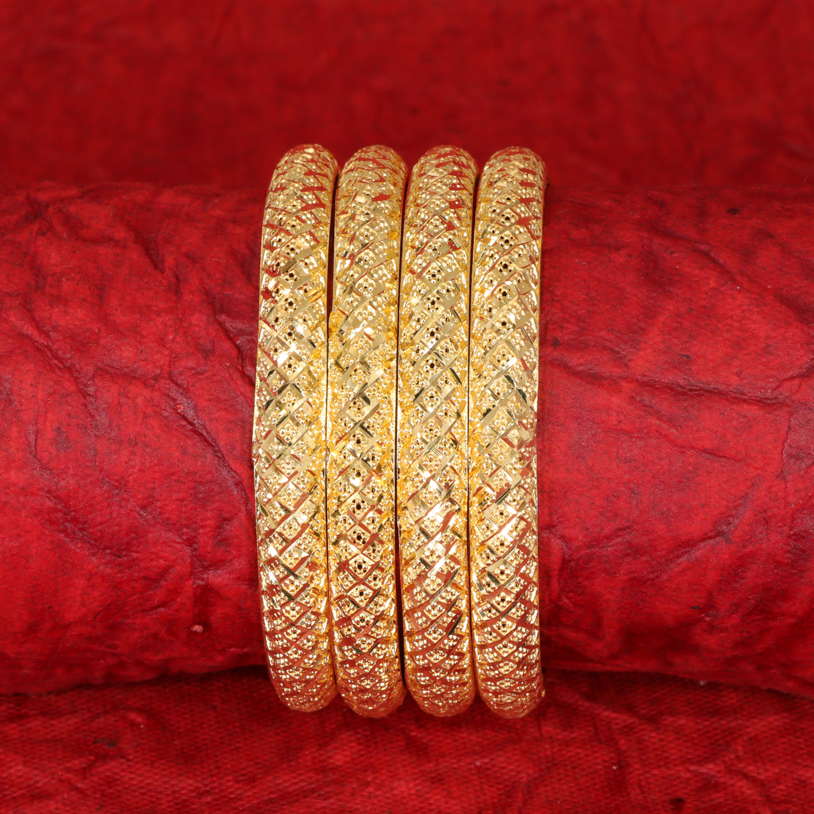 Intricate Crisscross Pattern Forming Bangles with Engraved Surface