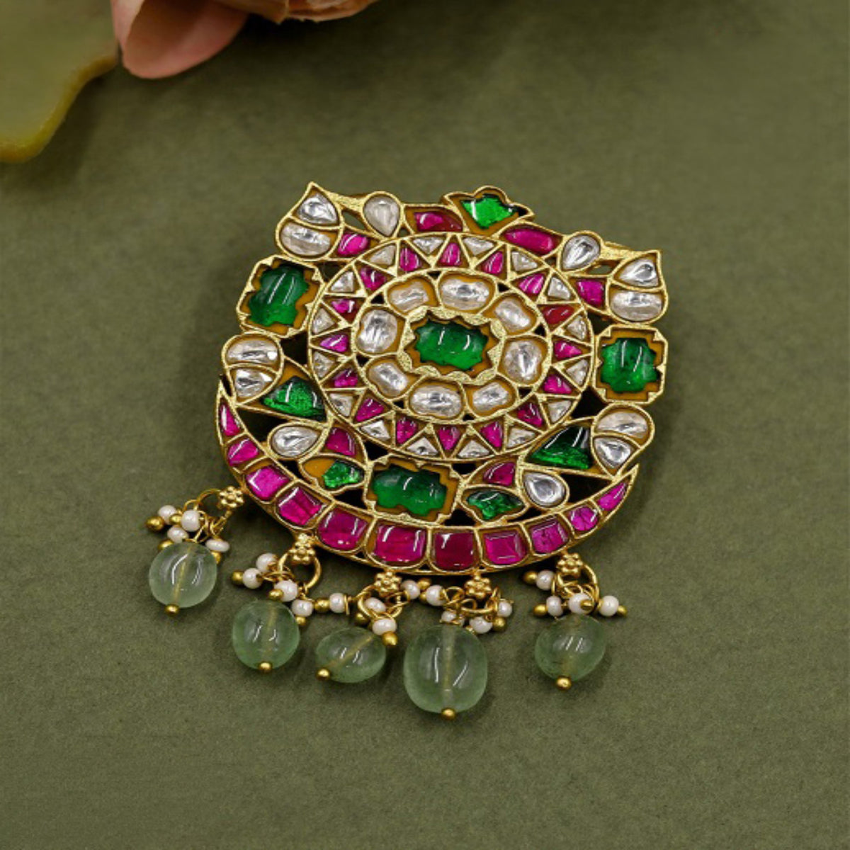 Premium Jadau pendant with ornate detailing, structured patterns and delicate drop accents