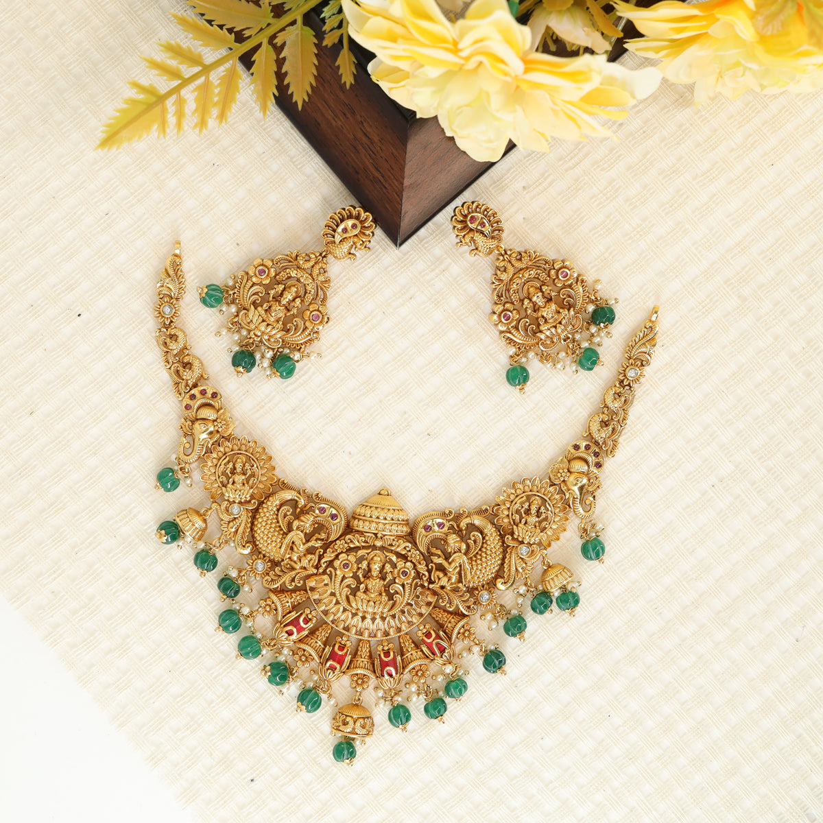 Elaborate Lakshmi Shrine Necklace with Curved Stone Insets and Fringe Detailing