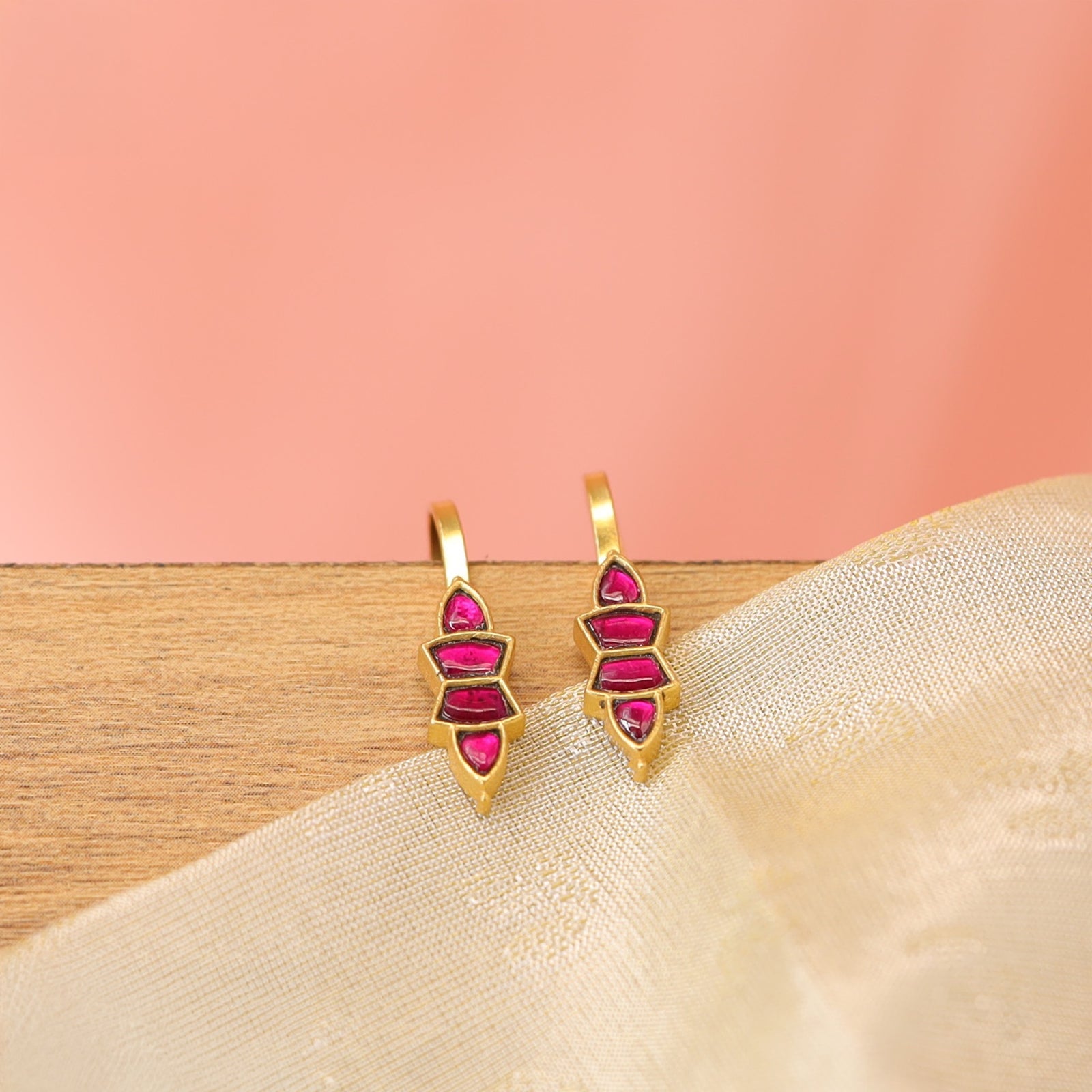 Angular drop bugadi with stacked geometric stone segments