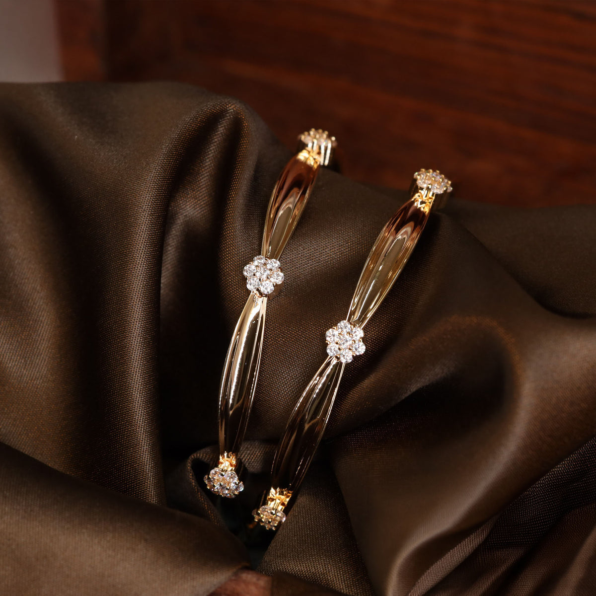 Sculpted Gold Finish Bangles with Floral Stone Cluster Ends